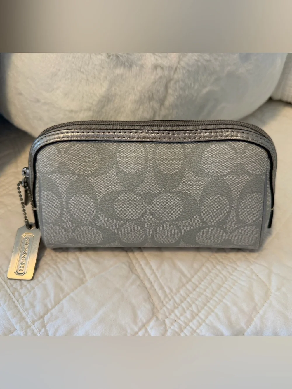 Coach Metallic Silver Signature Cosmetic Pouch with Metal hangtag.